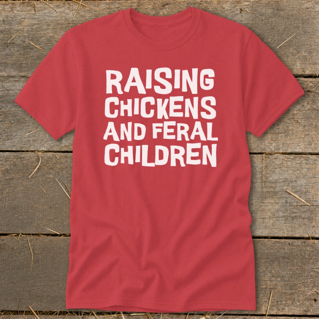 Red t-shirt with white text "RAISING CHICKENS AND FERAL CHILDREN".