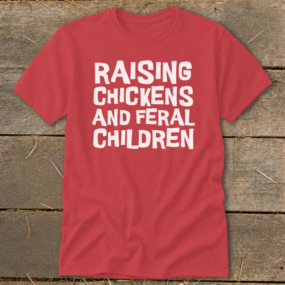 Red t-shirt with white text "RAISING CHICKENS AND FERAL CHILDREN".