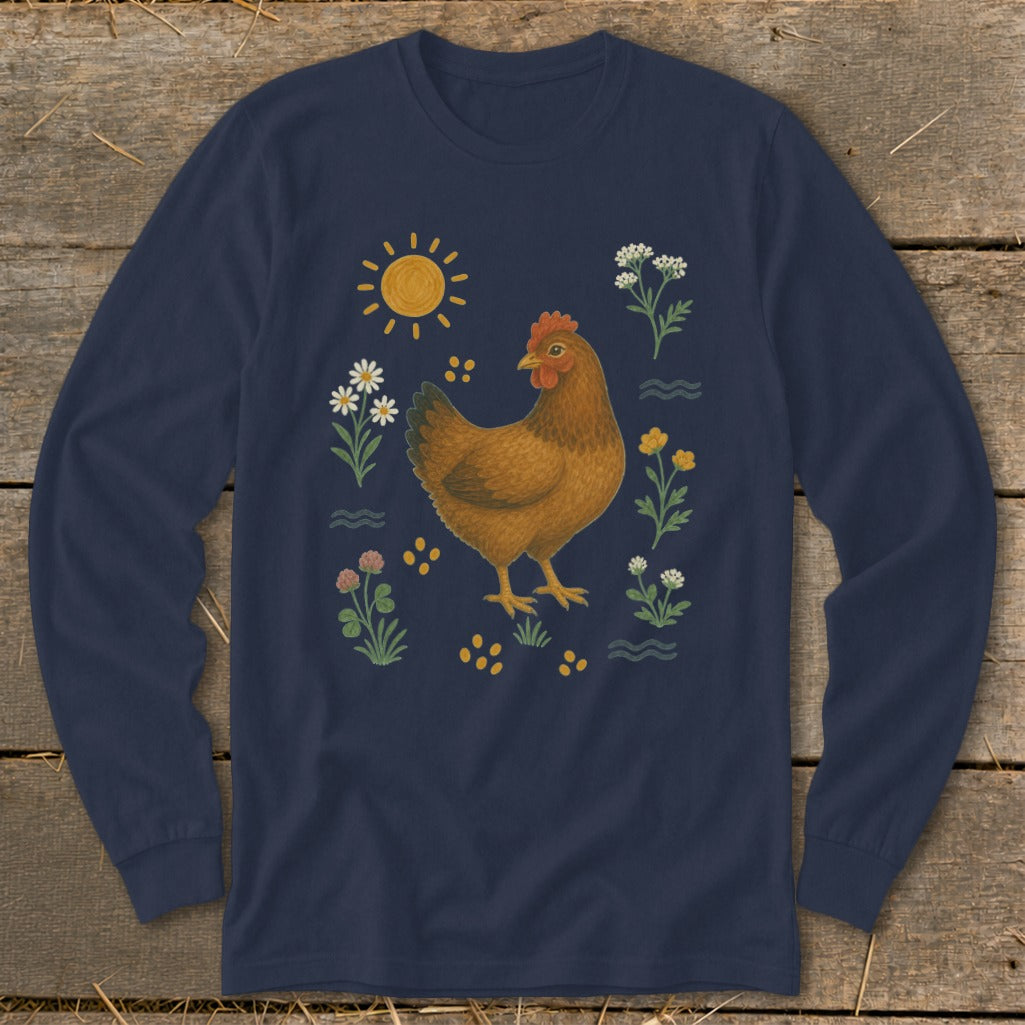 Brown hen surrounded by flowers, sun, and yellow dots on a navy long-sleeve shirt.