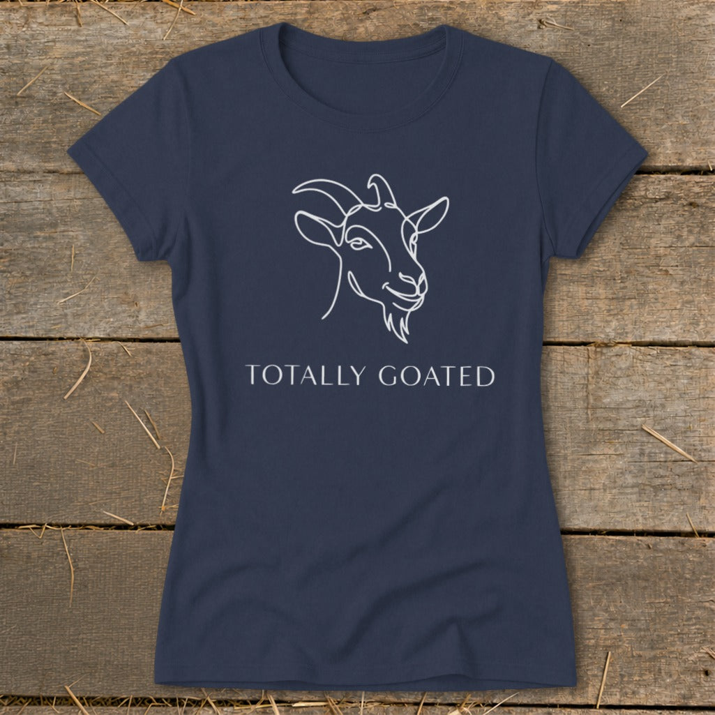 Navy t-shirt with white line drawing of a goat's head and text "TOTALLY GOATED".