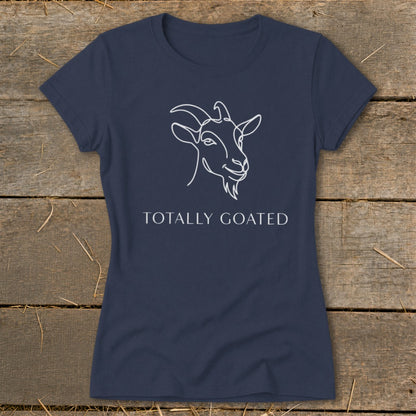 Navy t-shirt with white line drawing of a goat's head and text "TOTALLY GOATED".