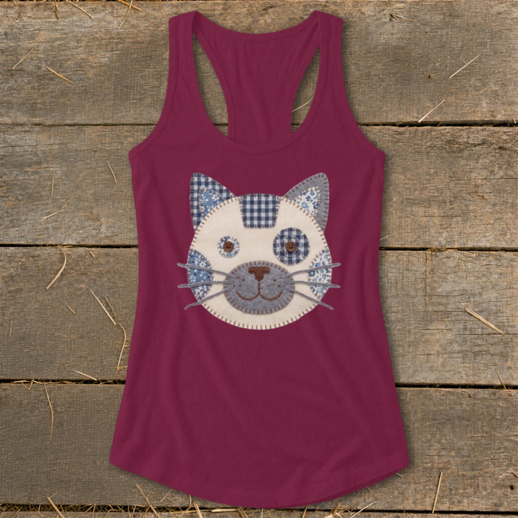 Burgundy racerback tank top with a patchwork cat face applique.