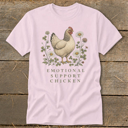 Pink t-shirt with a drawing of a chicken and flowers, text reads "EMOTIONAL SUPPORT CHICKEN".