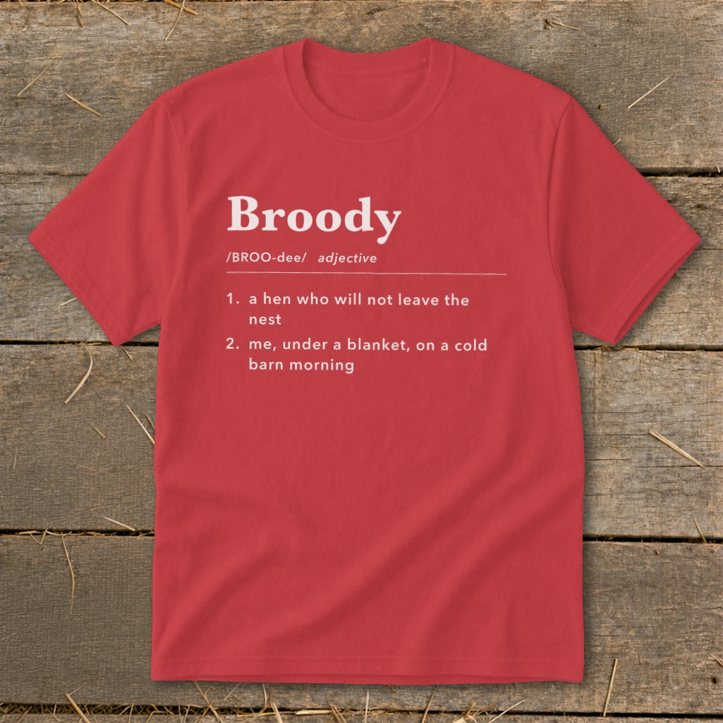Red t-shirt with "Broody" definition: hen not leaving nest, or me under blanket.