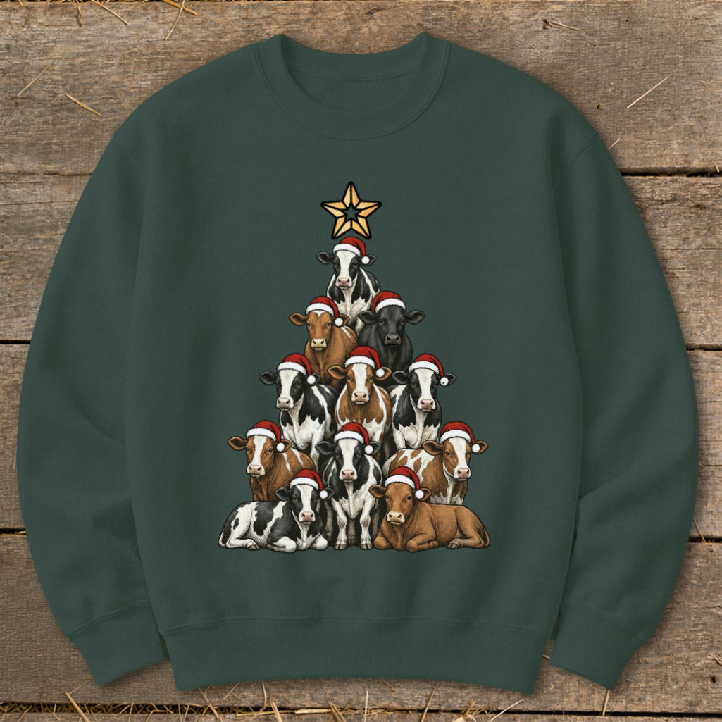 Christmas tree made of cows wearing Santa hats, with a star on top.