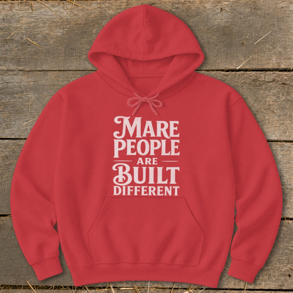 Red hoodie with "Mare People Are Built Different" text graphic.