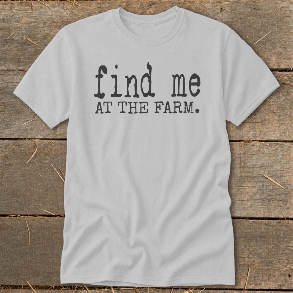 Light gray t-shirt with black text "find me AT THE FARM."