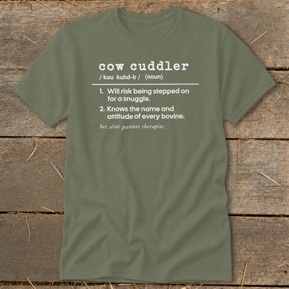 Green t-shirt with white text defining "cow cuddler" and "pasture therapist."