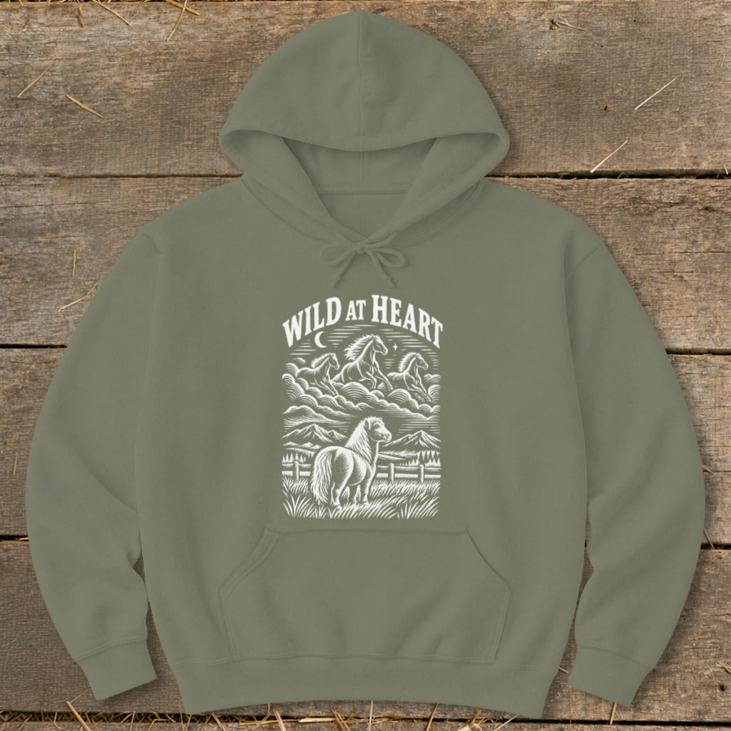 Olive green hoodie with white graphic art of horses and mountains, text reads "WILD AT HEART".