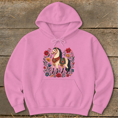 Pink hoodie with a colorful floral illustration of a decorated horse.