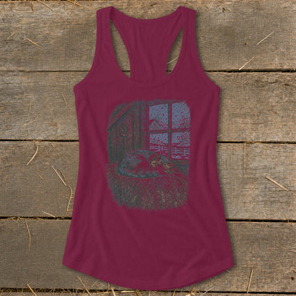 Maroon tank top with a print of a cat sleeping in hay by a window during a snowfall.