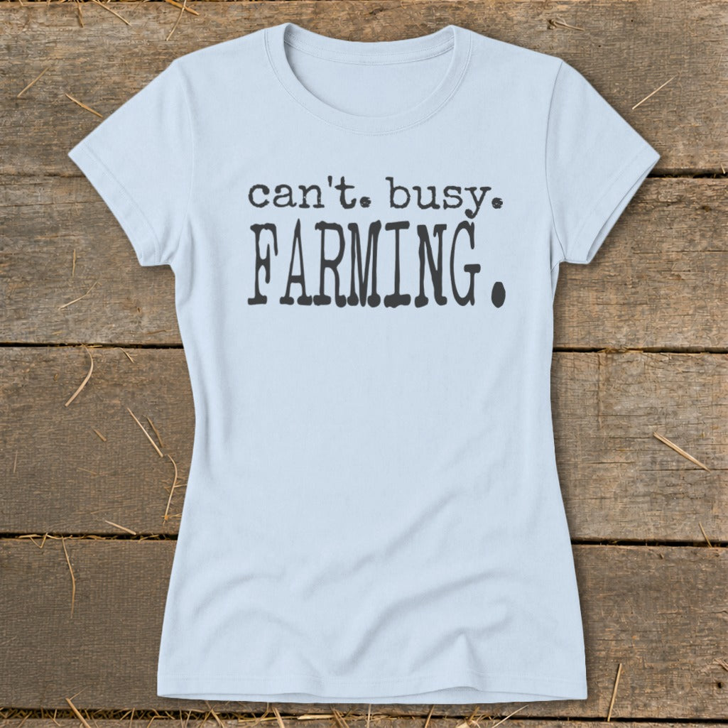 Light blue t-shirt with black text that reads "can't. busy. FARMING."