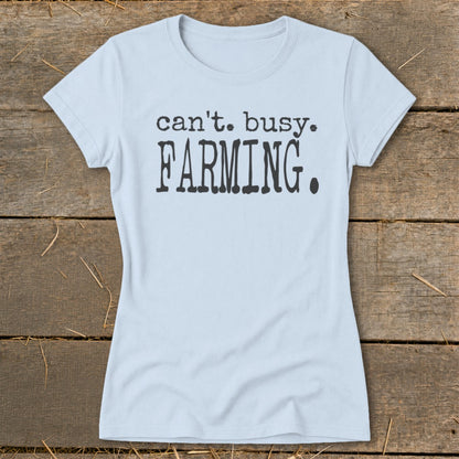 Light blue t-shirt with black text that reads "can't. busy. FARMING."