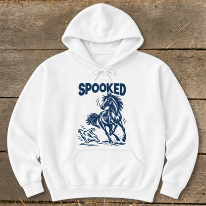 White hoodie with "SPOOKED" text and a dark blue horse and ghost graphic.