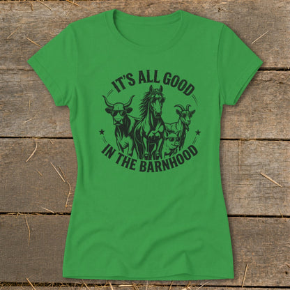 Green t-shirt with black graphic of cow, horse, pig, and goat wearing sunglasses with text "IT'S ALL GOOD IN THE BARNHOOD".
