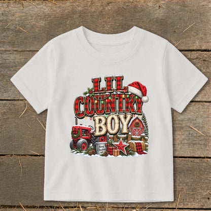 White t-shirt with "Lil Country Boy" Christmas graphic, tractor, and barn.