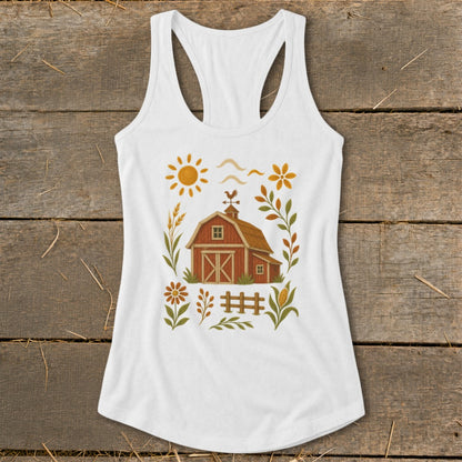 White tank top with a rustic barn, sun, and floral graphic.