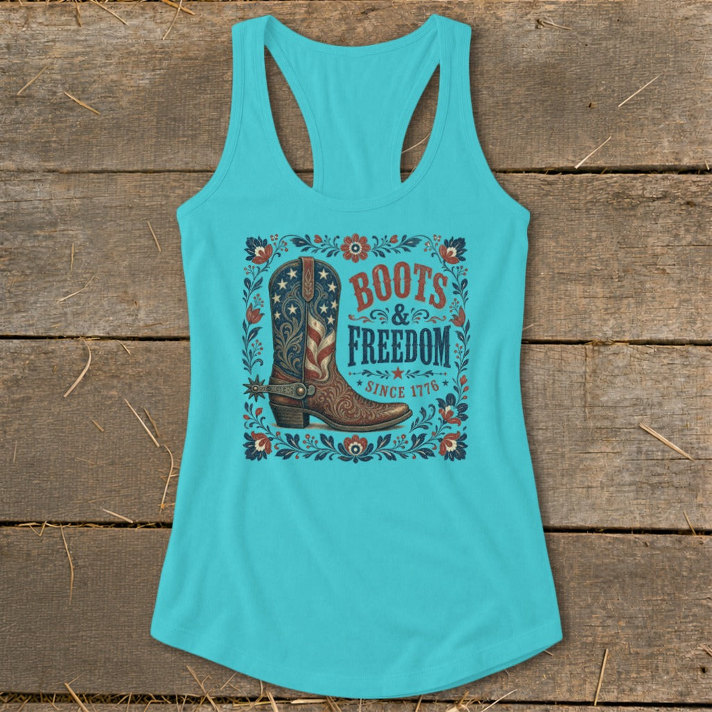 Turquoise tank top with a floral border, American flag cowboy boot, and text "Boots & Freedom Since 1776".