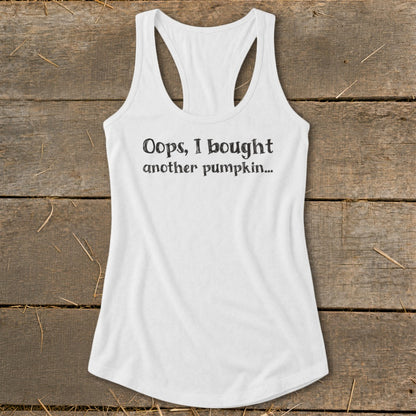 White tank top with black text that reads "Oops, I bought another pumpkin..."