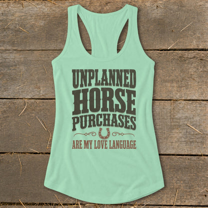 Mint green tank top with "UNPLANNED HORSE PURCHASES ARE MY LOVE LANGUAGE" text and horseshoe graphic.