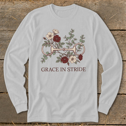 Light grey long-sleeved shirt with horse bit and floral graphic and text GRACE IN STRIDE.