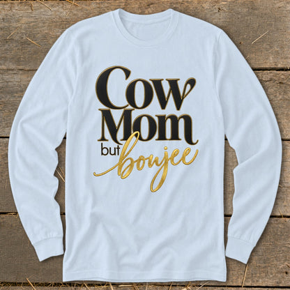 Long sleeve t-shirt with text "Cow Mom but boujee" in black and gold.