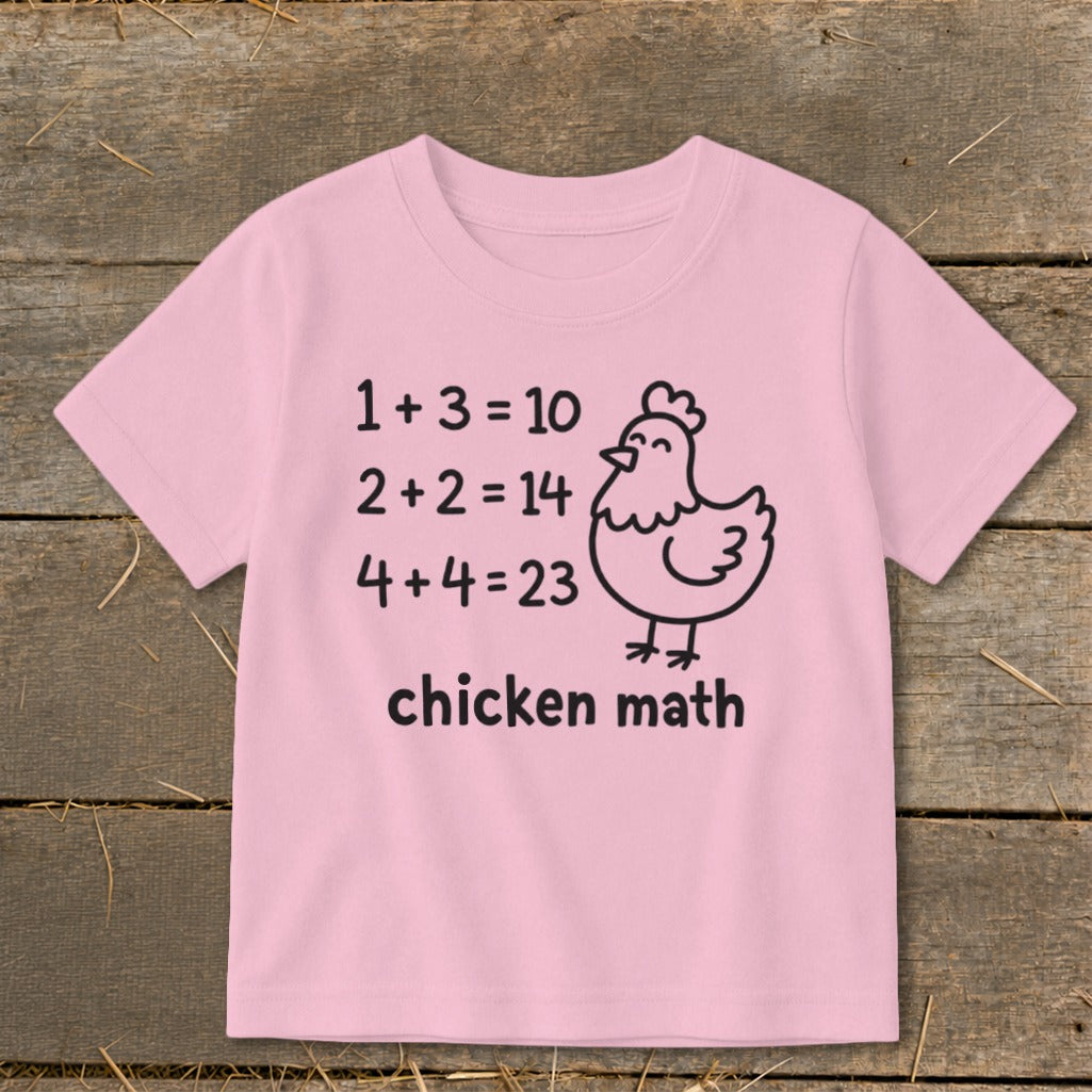 Pink t-shirt with "chicken math" and funny math equations with a chicken illustration.