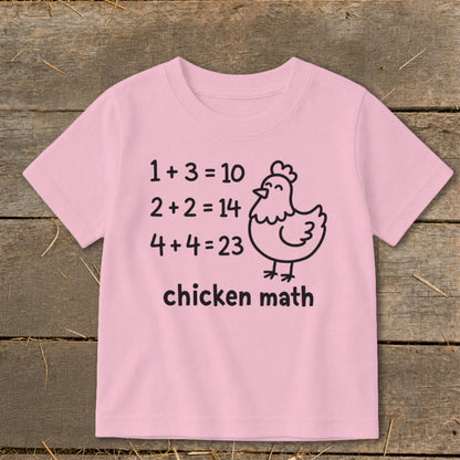 Pink t-shirt with "chicken math" and funny math equations with a chicken illustration.