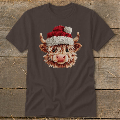 Brown t-shirt with a fluffy Highland cow wearing a Santa hat.