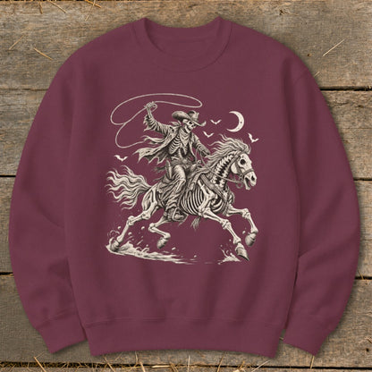 Skeleton cowboy riding a skeleton horse, holding a lasso under a crescent moon.