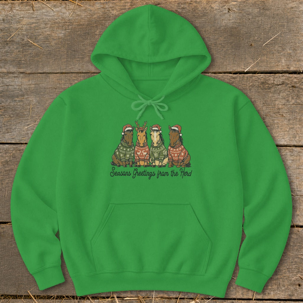 Green hoodie with cartoon horses in Christmas sweaters and Santa hats.