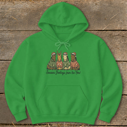 Green hoodie with cartoon horses in Christmas sweaters and Santa hats.