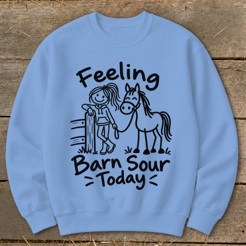 Light blue sweatshirt with black graphic of a girl and horse, reading "Feeling Barn Sour Today".
