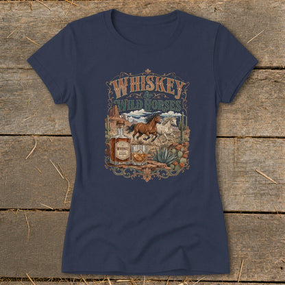 Navy t-shirt with "Whiskey & Wild Horses" graphic featuring horses, whiskey bottle, and desert landscape.
