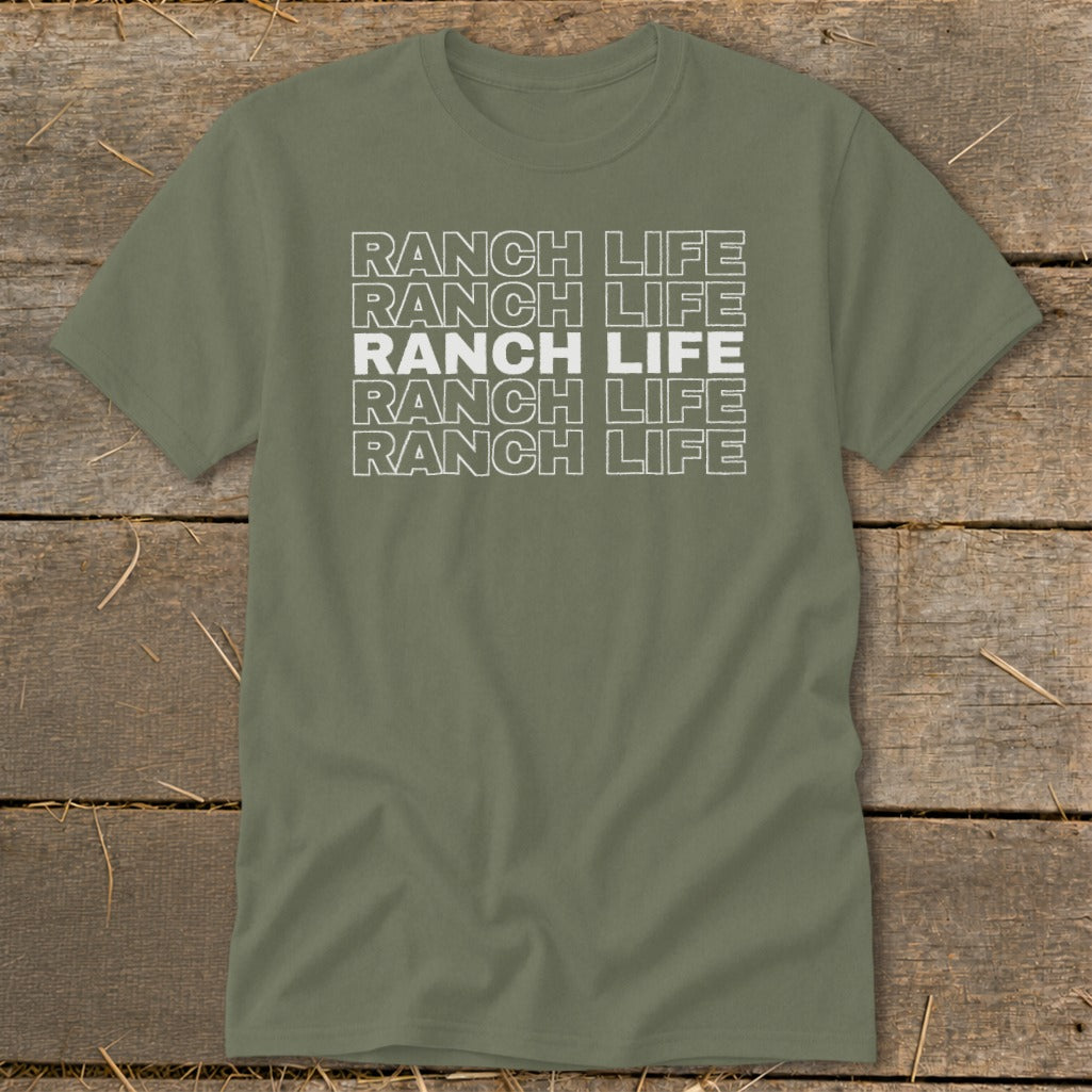 An olive green t-shirt with white block text reading "RANCH LIFE" repeated five times on the chest.