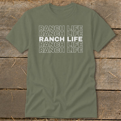 An olive green t-shirt with white block text reading "RANCH LIFE" repeated five times on the chest.