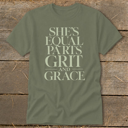 Olive green t-shirt with text "SHE'S EQUAL PARTS GRIT AND GRACE"