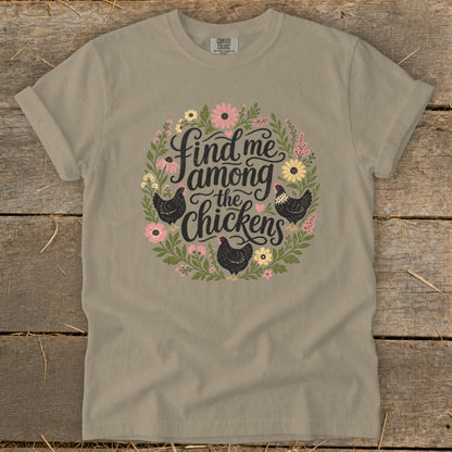 T-shirt with "Find me among the chickens" text and chicken illustration.