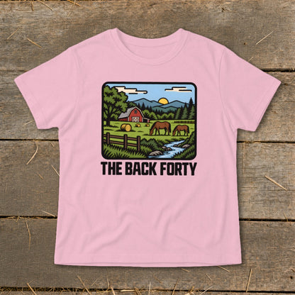 A pink children's t-shirt displays a farm graphic with horses, a red barn, and the text "The Back Forty".