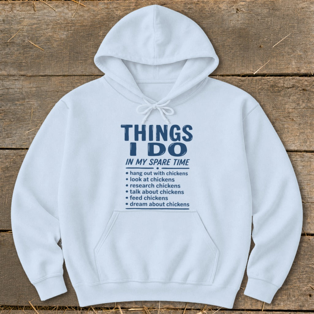 White hoodie with "Things I Do In My Spare Time" text about chickens.