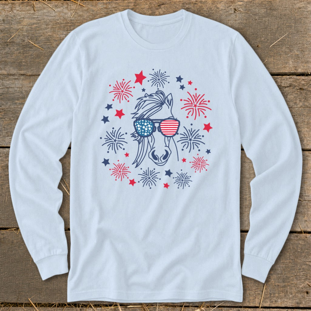 Line art horse wearing sunglasses with fireworks and stars on a light blue long sleeve shirt.