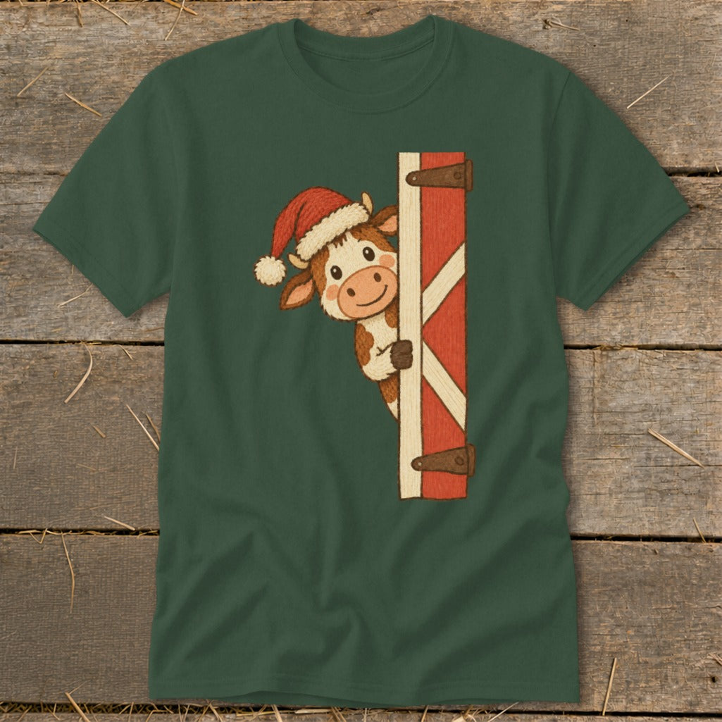 Cartoon cow wearing a Santa hat peeking around a barn door.