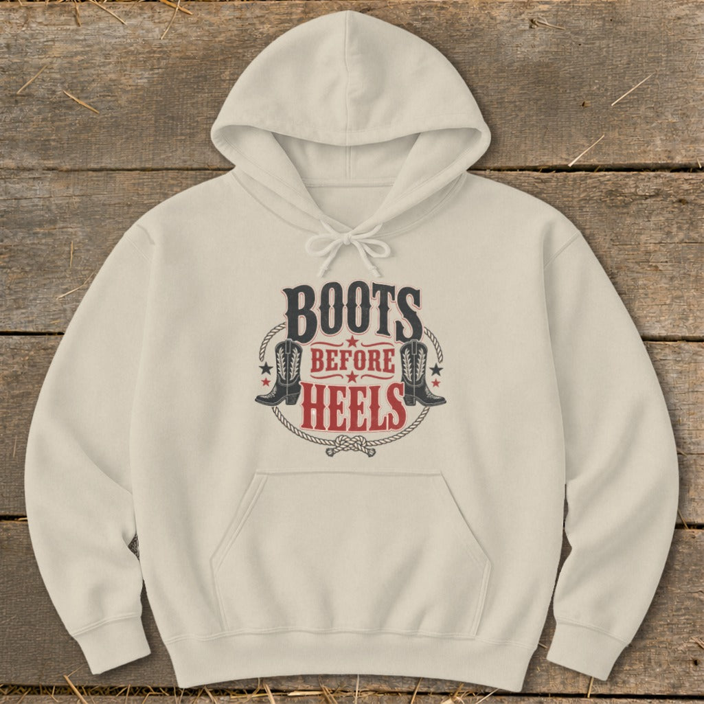Cream hoodie with "Boots Before Heels" text and cowboy boot graphics.