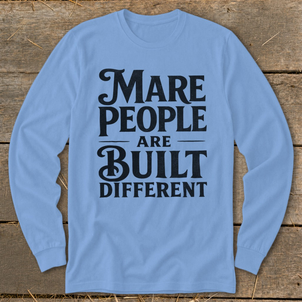 Light blue long-sleeve shirt with black text: "Mare people are built different."