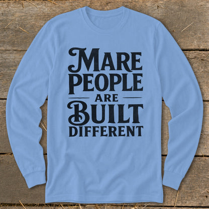 Light blue long-sleeve shirt with black text: "Mare people are built different."