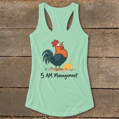 Mint green tank top with cartoon rooster crowing at sunrise and text "5 AM Management."