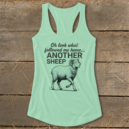 Mint green tank top with "Oh look what followed me home... ANOTHER SHEEP" text and sheep graphic.