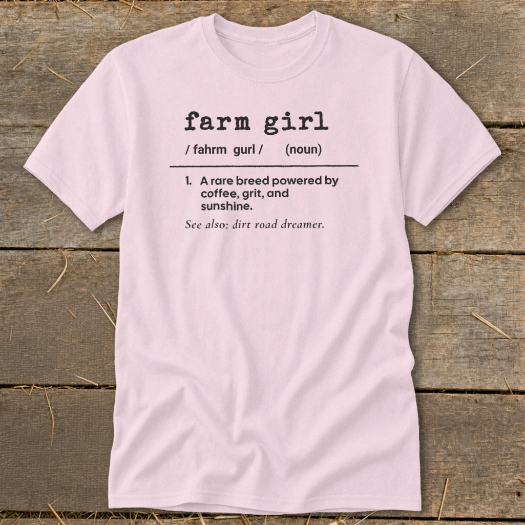 Pink t-shirt with "farm girl" definition: a rare breed powered by coffee, grit, and sunshine.