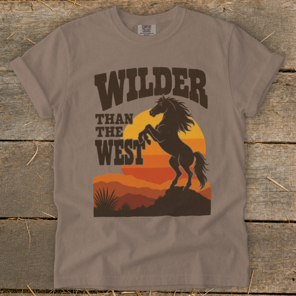T-shirt with "Wilder Than The West" text and rearing horse graphic.