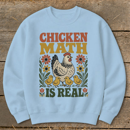 Light blue sweatshirt with "Chicken Math Is Real" and a hen with chicks.